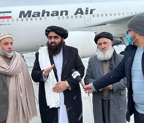 Taliban foreign minister Amir Khan Muttaqi at the airport before leaving for Tehran.