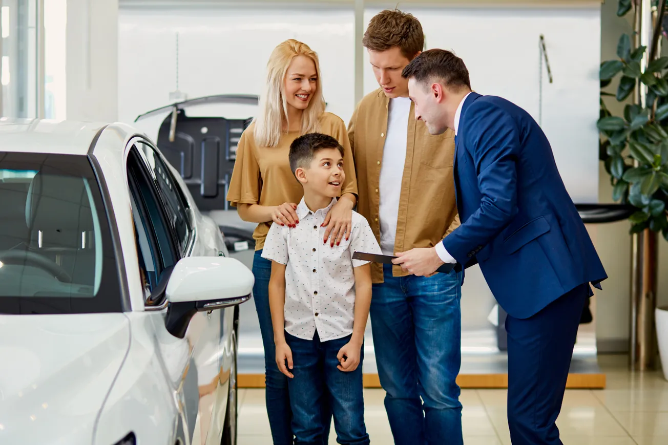 Family buying a new car