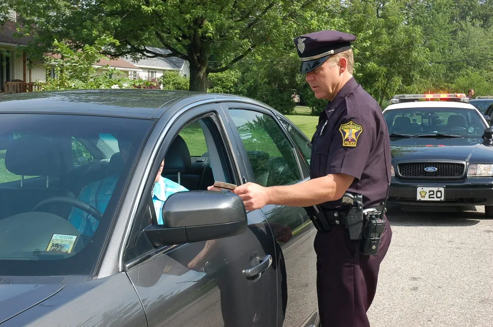 American Police officer issuing ticket