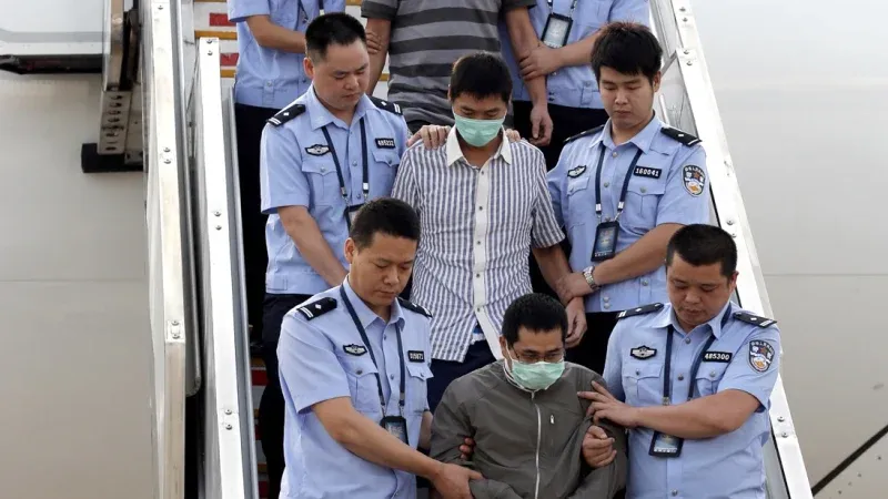 Chinese dissident being arrested upon landing in china