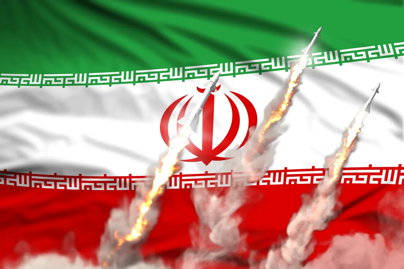 Missiles being launched in front of an Iranian Flag