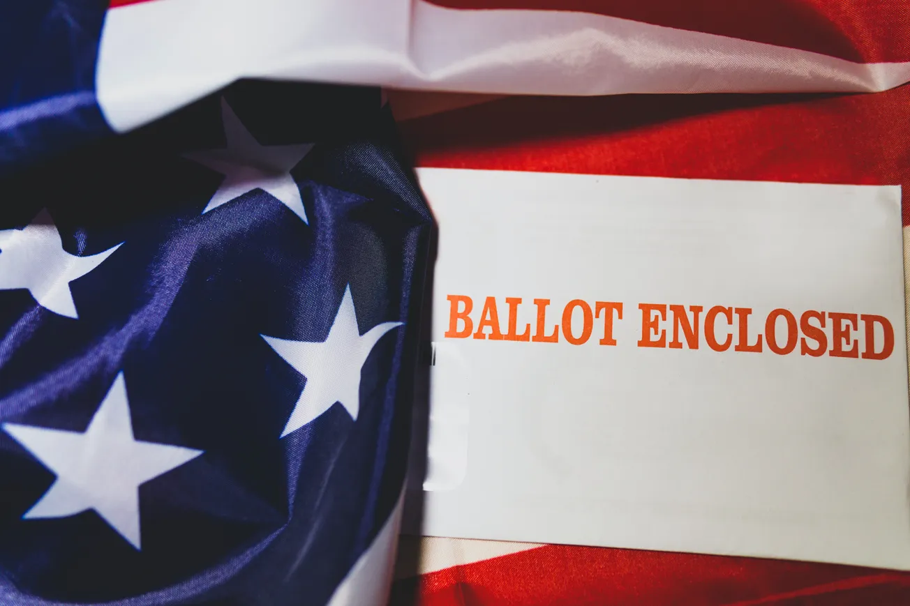 Ballot enclosed over american flag