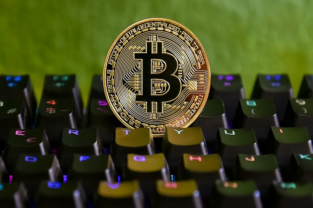 Bitcoin on a computer keyboard