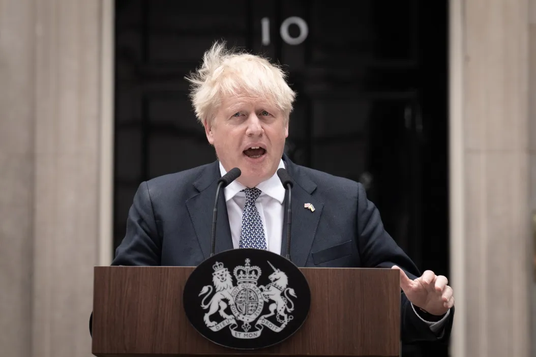 Prime Minister Boris Johnson reads a statement outside 10 Downing Street, London