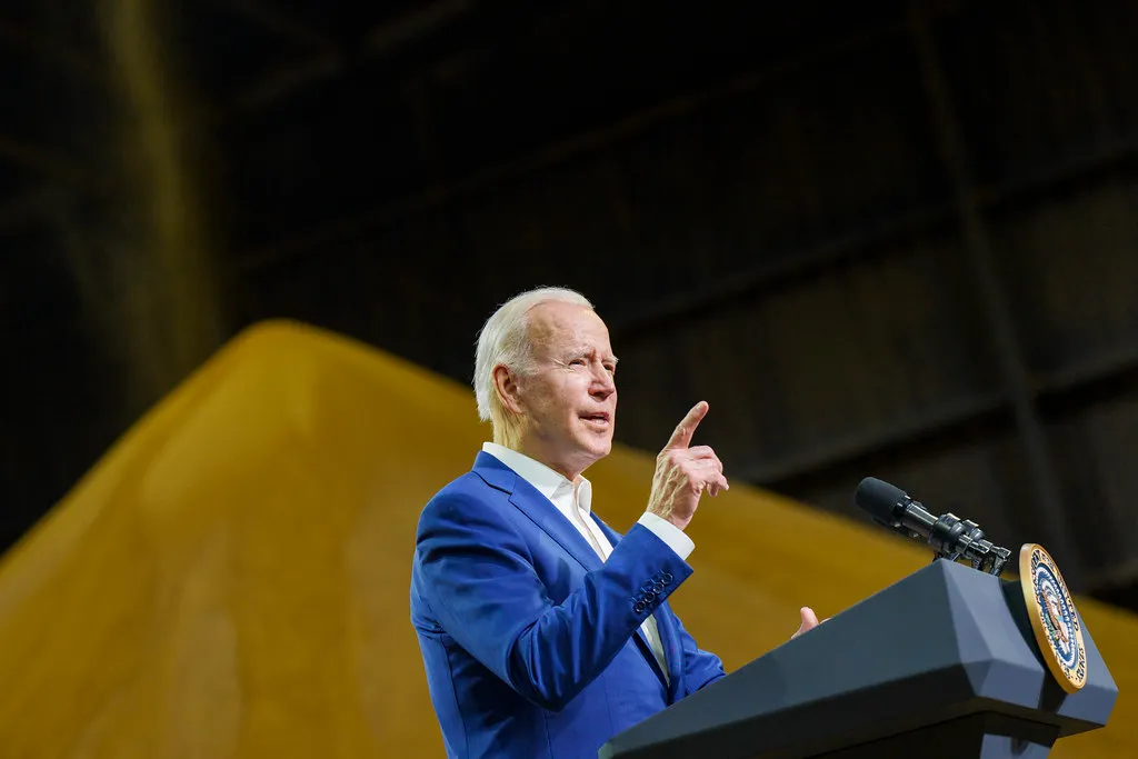 President Joe Biden of the United States raising finger and giving a speech