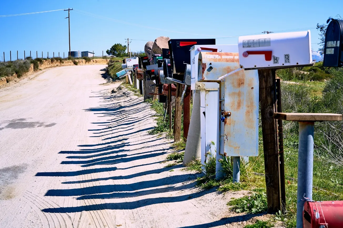 Trump’s Tariff Shift Forces Postal Services To Halt Shipments To America